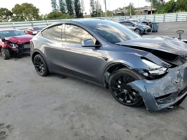 2023 Tesla Model Y VIN: 7SAYGDEE9PA118828 Lot: 84454884