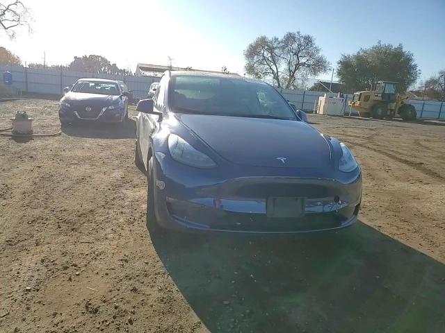 2023 Tesla Model Y VIN: 7SAYGDEF9PF666081 Lot: 85656944