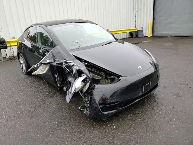 2023 Tesla Model Y VIN: 7SAYGDEE3PA187661 Lot: 84500954