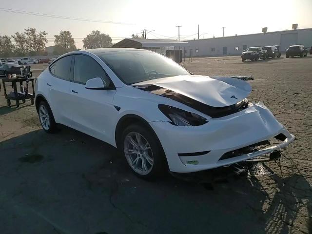 2023 Tesla Model Y VIN: 7SAYGDEE6PA084928 Lot: 82975194