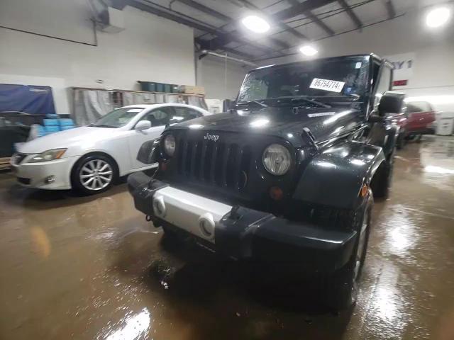 2012 Jeep Wrangler Sahara VIN: 1C4GJWBGXCL202114 Lot: 86754774