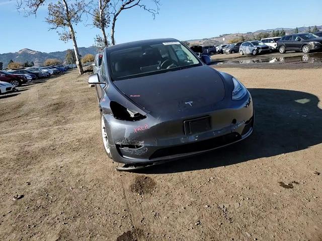 2021 Tesla Model Y VIN: 5YJYGDEE1MF188562 Lot: 83052674