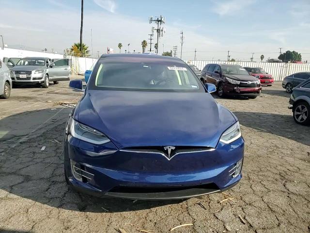 2016 Tesla Model X VIN: 5YJXCBE4XGFS00067 Lot: 82230664