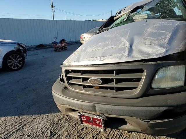 2003 Ford F150 VIN: 1FTRF18233NA90611 Lot: 70284375