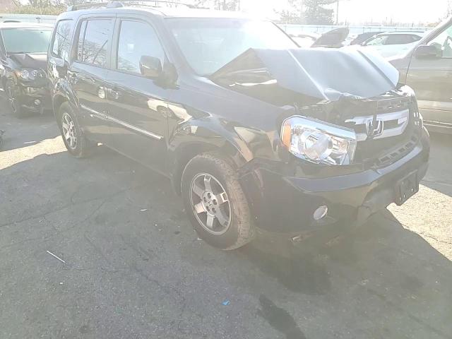 2011 Honda Pilot Touring VIN: 5FNYF4H99BB092788 Lot: 82417904