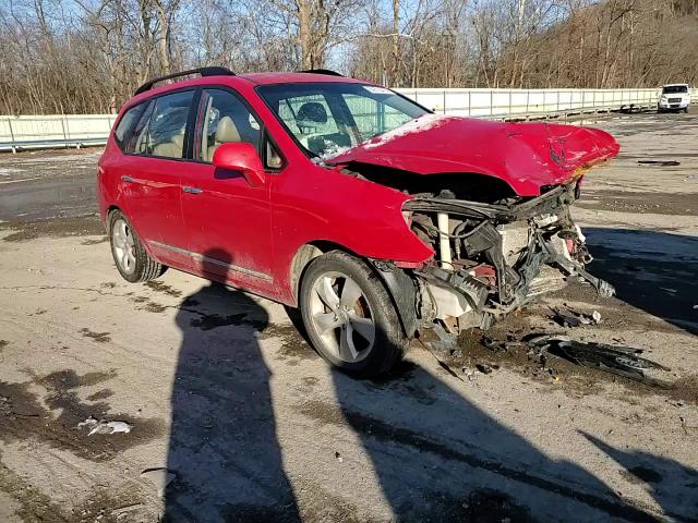 2009 Kia Rondo Base VIN: KNAFG528797277039 Lot: 84315414