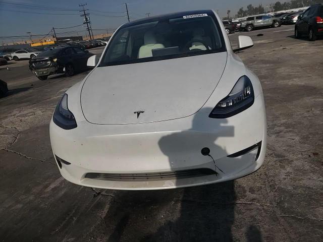 2023 Tesla Model Y VIN: 7SAYGDEE4PA125735 Lot: 82959364