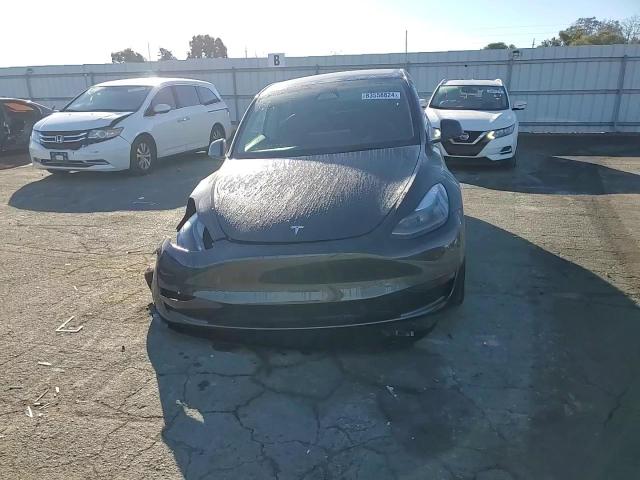 2024 Tesla Model Y VIN: 7SAYGDED4RF124582 Lot: 83558824