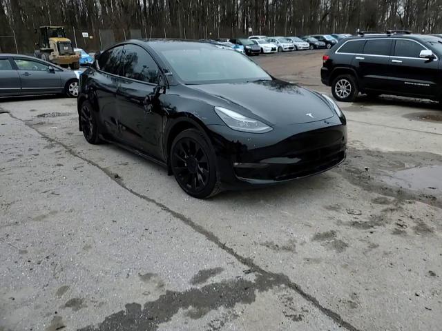 2023 Tesla Model Y VIN: 7SAYGAEE7PF786600 Lot: 85268664