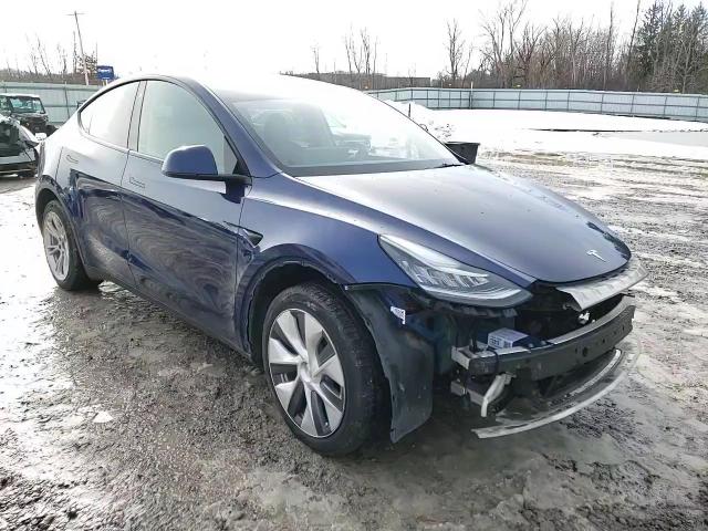 2023 Tesla Model Y VIN: 7SAYGDEE8PA124300 Lot: 83948804