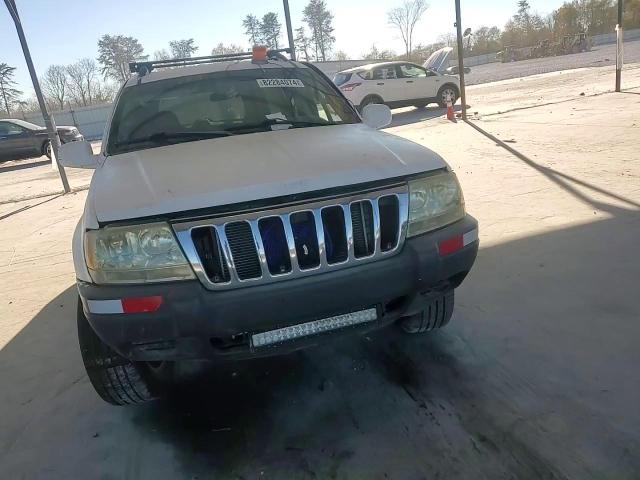 2003 Jeep Grand Cherokee Laredo VIN: 1J4GW48S13C580284 Lot: 82284074