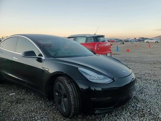 2019 Tesla Model 3 VIN: 5YJ3E1EB0KF194838 Lot: 86344644