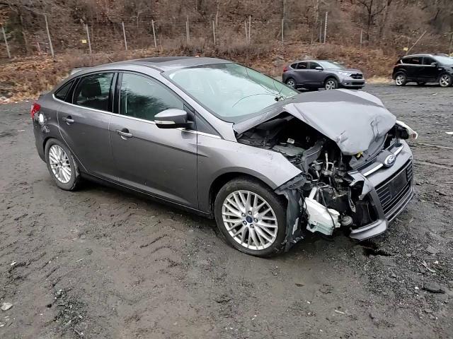 2014 Ford Focus Titanium VIN: 1FADP3J27EL446186 Lot: 84482984