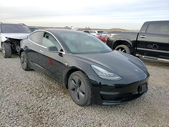 2019 Tesla Model 3 VIN: 5YJ3E1EA9KF323652 Lot: 84564104