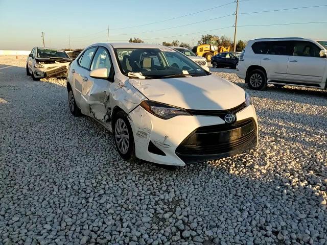 2017 Toyota Corolla L VIN: 5YFBURHE9HP703454 Lot: 84199564