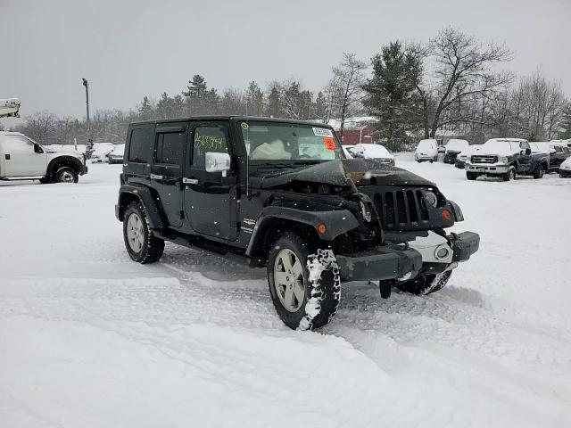 2010 Jeep Wrangler Unlimited Sahara VIN: 1J4BA5H14AL102931 Lot: 85633994