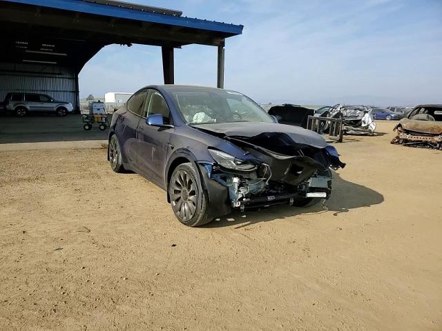 2023 Tesla Model Y VIN: 7SAYGDEF5PF776979 Lot: 84487764