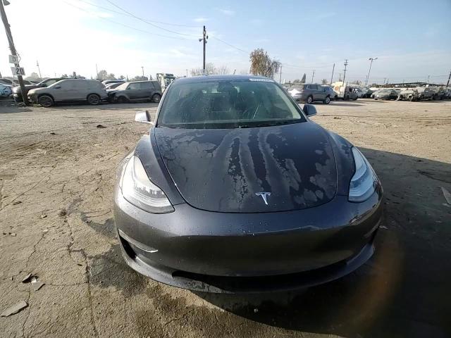 2018 Tesla Model 3 VIN: 5YJ3E1EB9JF094011 Lot: 85995594