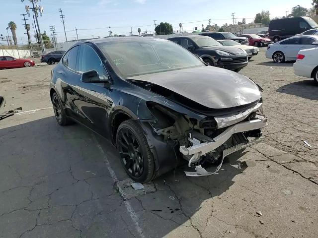 2023 Tesla Model Y VIN: 7SAYGDEE9PA122569 Lot: 85086164