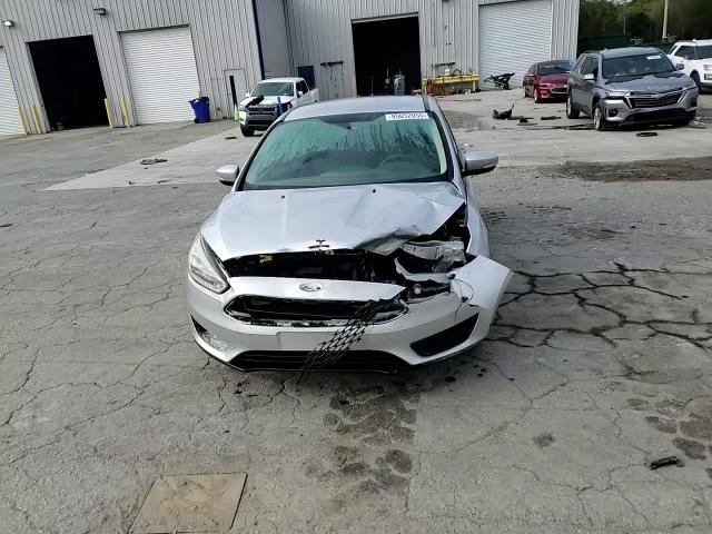 2015 Ford Focus Se VIN: 1FADP3K2XFL242272 Lot: 95052055