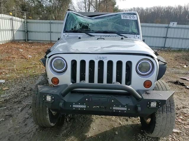 2012 Jeep Wrangler Sport VIN: 1C4AJWAGXCL198606 Lot: 95073215
