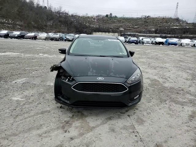 2015 Ford Focus Se VIN: 1FADP3F28FL379110 Lot: 95897175
