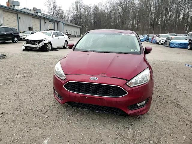 2016 Ford Focus Se VIN: 1FADP3F21GL385154 Lot: 96120455
