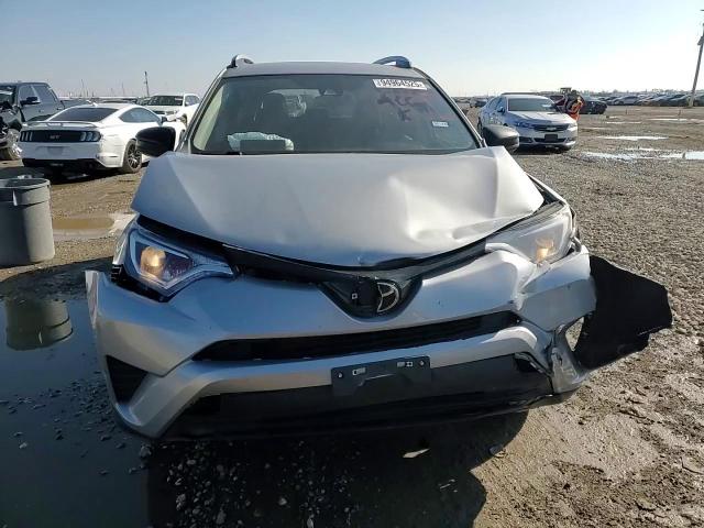 2018 Toyota Rav4 Le VIN: 2T3ZFREV3JW438877 Lot: 94964525