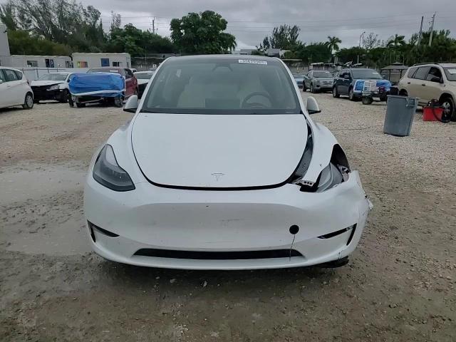 2023 Tesla Model Y VIN: 7SAYGAEE4PF898450 Lot: 95620965