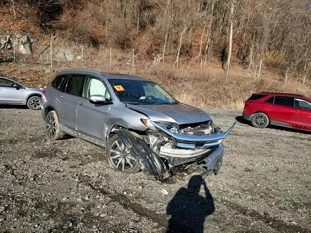 2020 Honda Pilot Elite VIN: 5FNYF6H05LB000879 Lot: 94277825