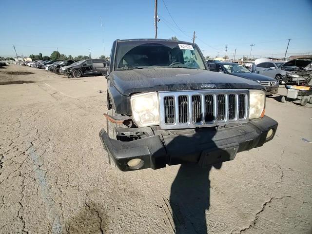 2007 Jeep Commander VIN: 1J8HH48K97C695976 Lot: 95213785