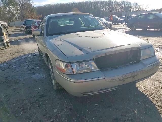 2004 Mercury Grand Marquis Gs VIN: 2MEFM74W34X627514 Lot: 94370615