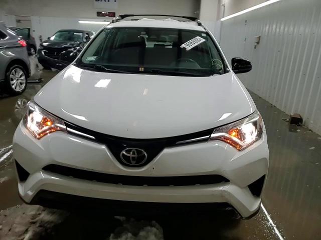2017 Toyota Rav4 Le VIN: JTMBFREV0HJ147943 Lot: 95959205