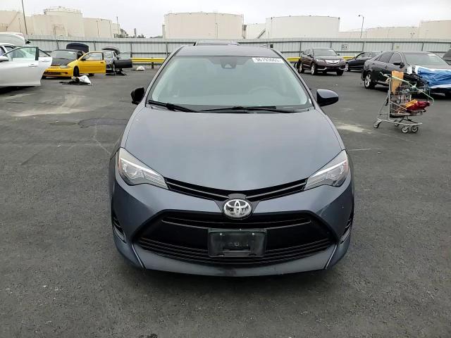 2017 Toyota Corolla L VIN: 5YFBURHE7HP645666 Lot: 96193065