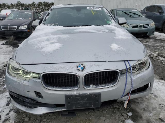 WBA8E5G58JNV03411 BMW 320 XI