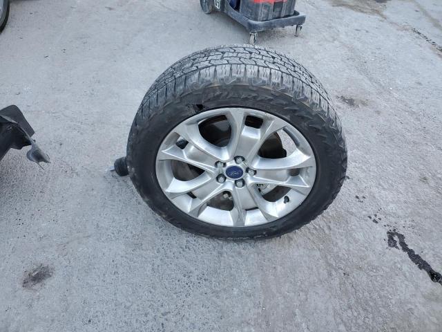 1FMCU9J95GUA69932 Ford ESCAPE TIT