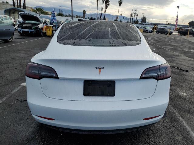 5YJ3E1EA7NF307034 Tesla 2022