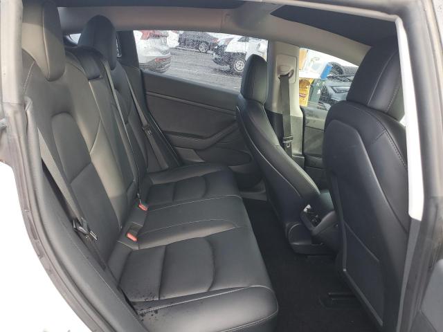 5YJ3E1EA7NF307034 Tesla 2022