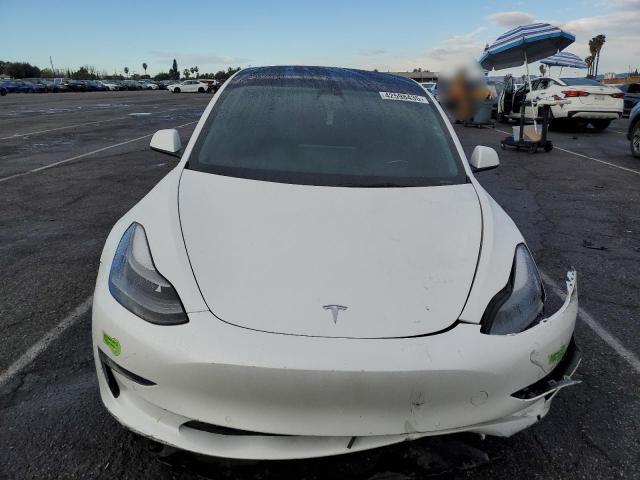 5YJ3E1EA7NF307034 Tesla 2022