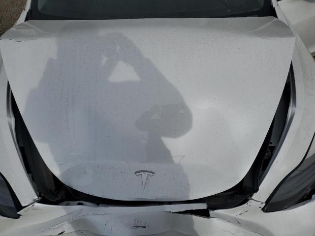 5YJ3E1EB2NF180959 Tesla 2022