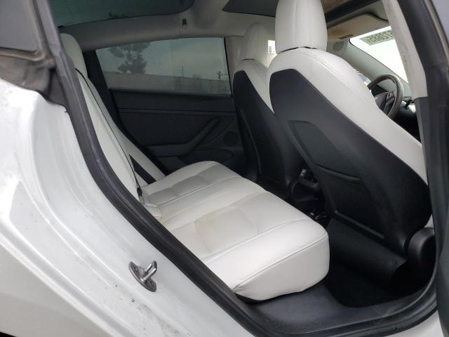 5YJ3E1EB2NF180959 Tesla 2022