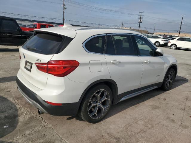 WBXHT3C3XG5E56219 BMW X1 Xdrive28i