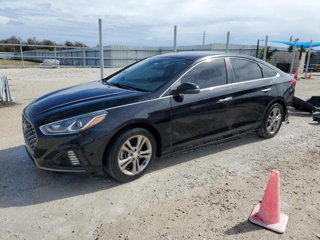 2019 5NPE34AF4KH767623 main image