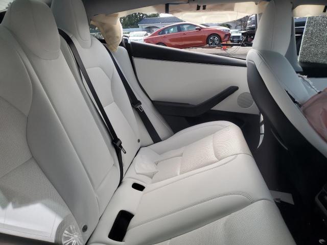 5YJ3E1EA4RF812230 Tesla 2024