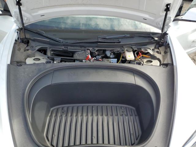 5YJ3E1EA4RF812230 Tesla 2024