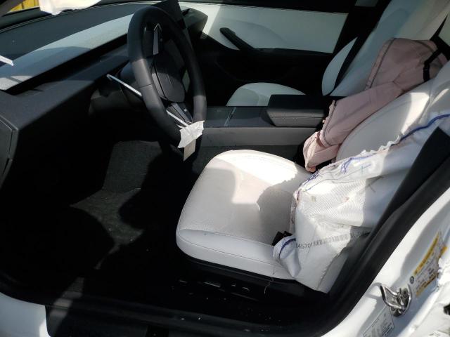 5YJ3E1EA4RF812230 Tesla 2024