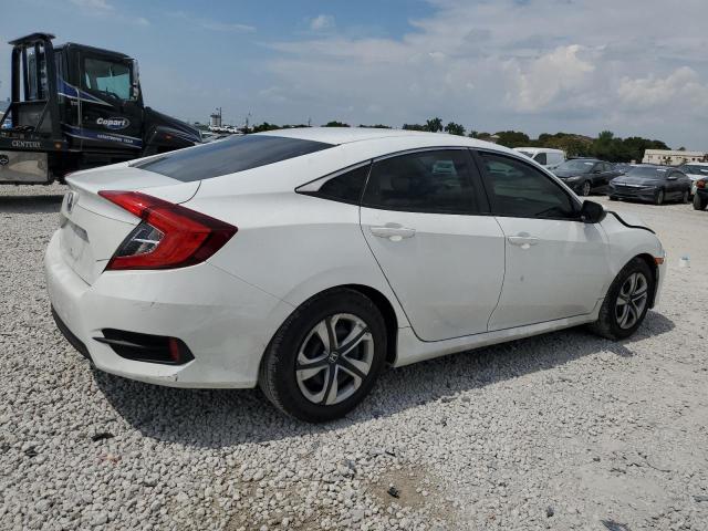 2HGFC2F57JH587084 Honda Civic Lx