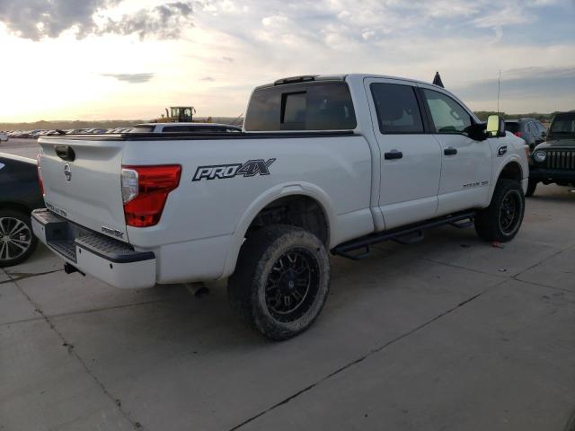 1N6BA1F40GN517590 Nissan Titan Xd Sl