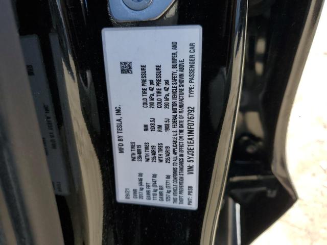 5YJ3E1EA1MF076792 Tesla 2021