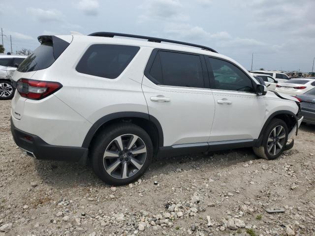 5FNYG2H70PB000877 Honda Pilot Touring